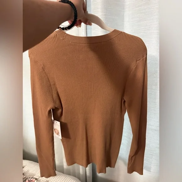 Nine West Tan Ribbed Sweater
Brand new with tags!
Size Large - Picture 8 of 9